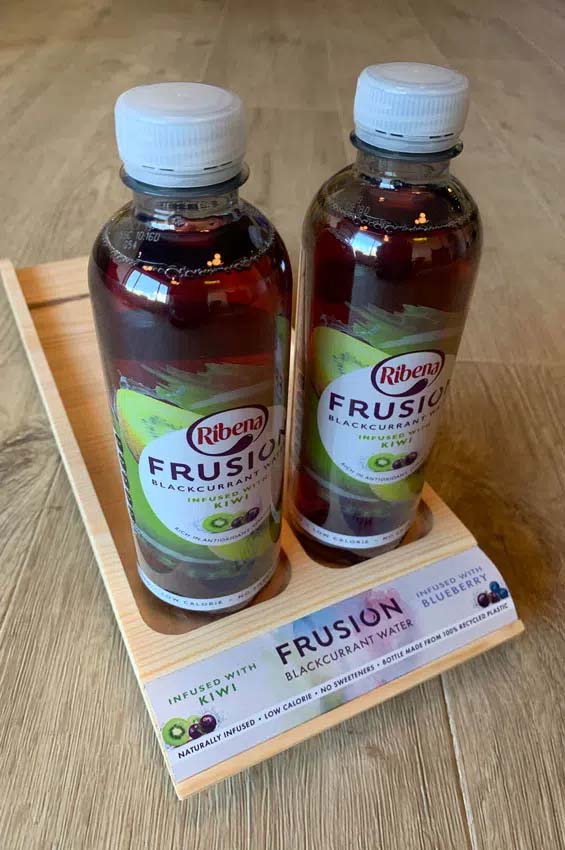 Point-of-purchase display design: Shelf tray, made from natural wood to underline the natural ingredients of the drink