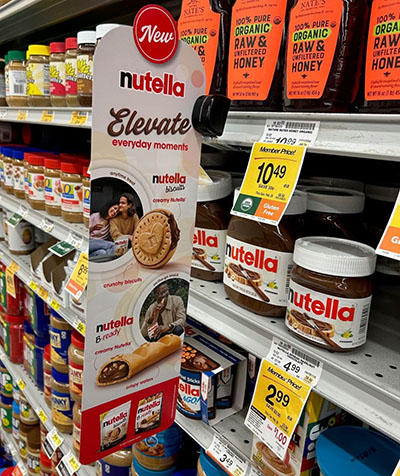 This shelf stopper tells Nutella's core consumers about the its new products in other categories