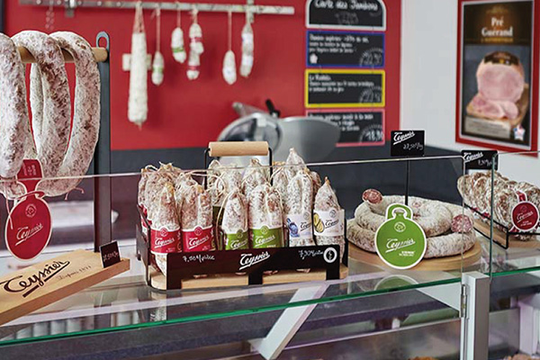 Countertop display line-up for dry-cured sausages by Teyssier Salaisons