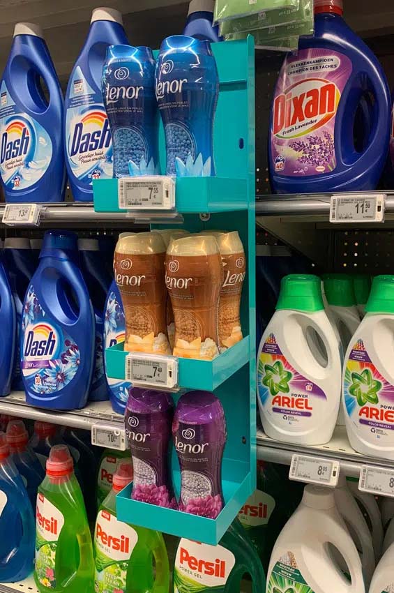Cross-merchandising wing for fabric softener
